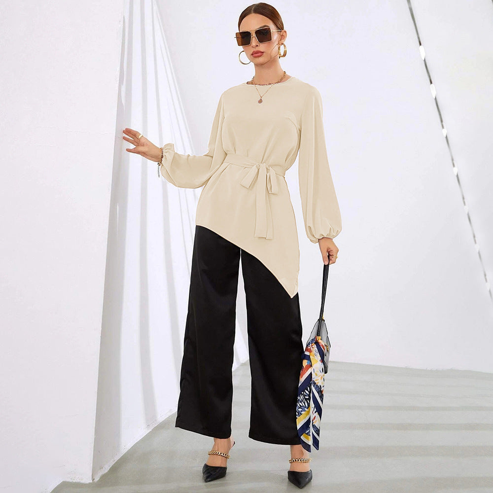 Women's asymmetrical blouse top with elegant ruffles and fashionable waist belt, size S