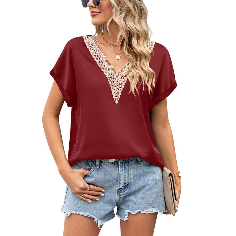 Damenbluse mit tiefem V-Ausschnitt und Häkeldetails, Größe