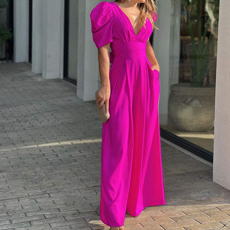 Eleganter Damen-Jumpsuit mit voluminösen Puffärmeln und tiefem V-Ausschnitt, Größe [size]