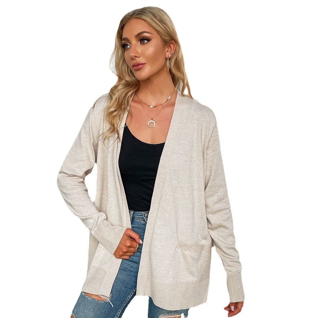 Women's casual knit cardigan with deep V-neck and practical pockets, size S