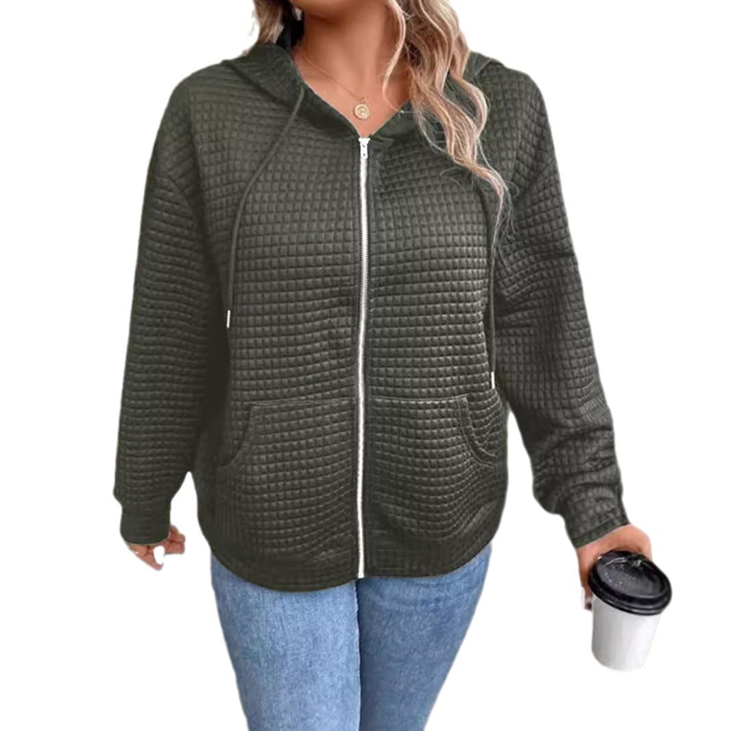 Women's loose-fitting hooded jacket with a textured waffle surface and practical pockets, size S