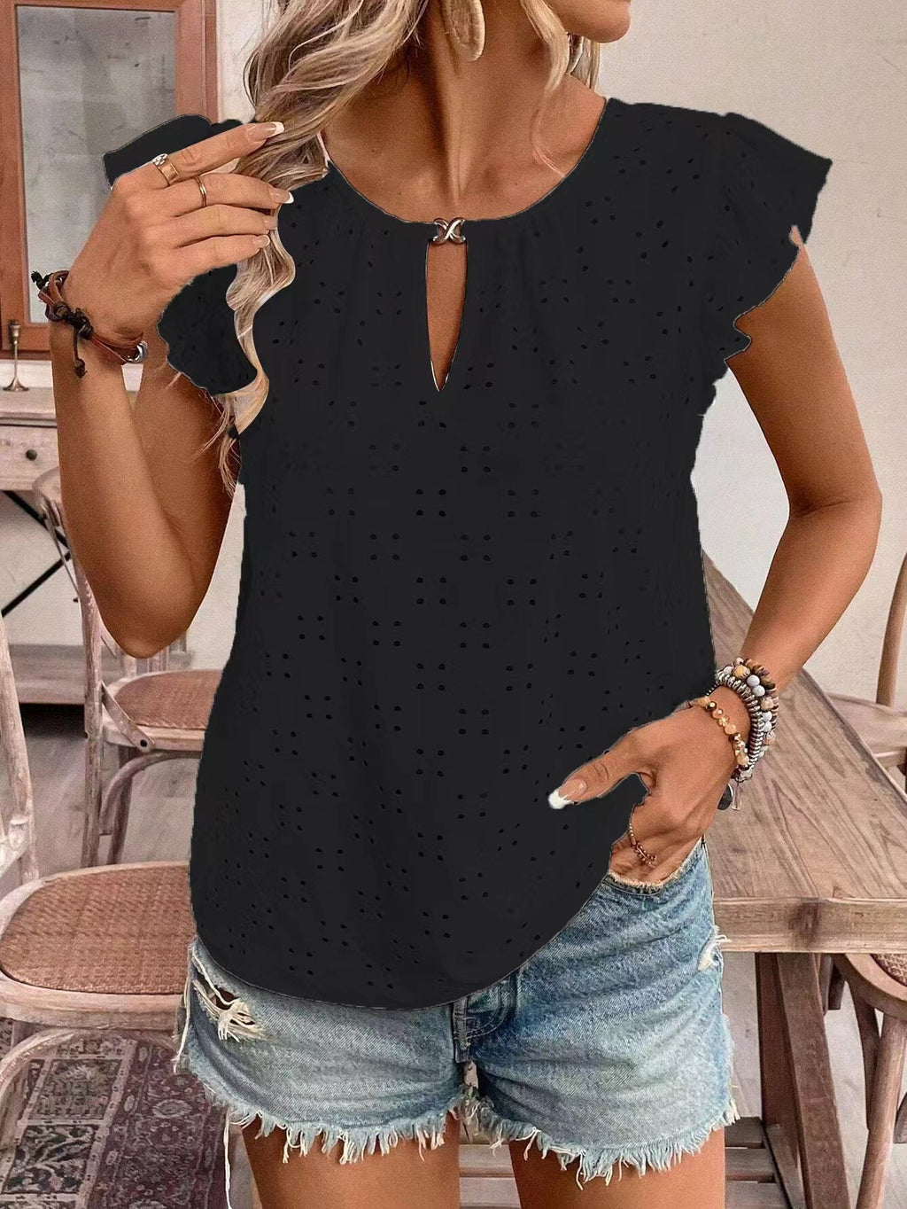 Women's blouse with ruffle details and eyelet embroidery, size