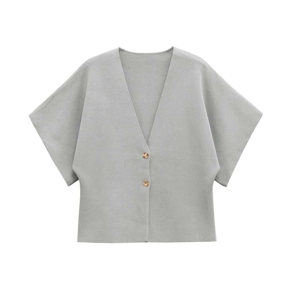 Women's lightweight cardigan with an elegant V-neck and luxurious button details, size S
