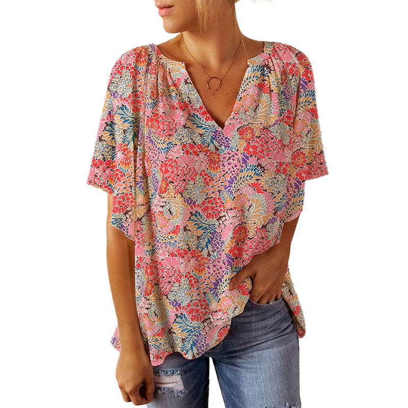 Women's blouse with floral design and relaxed fit, size