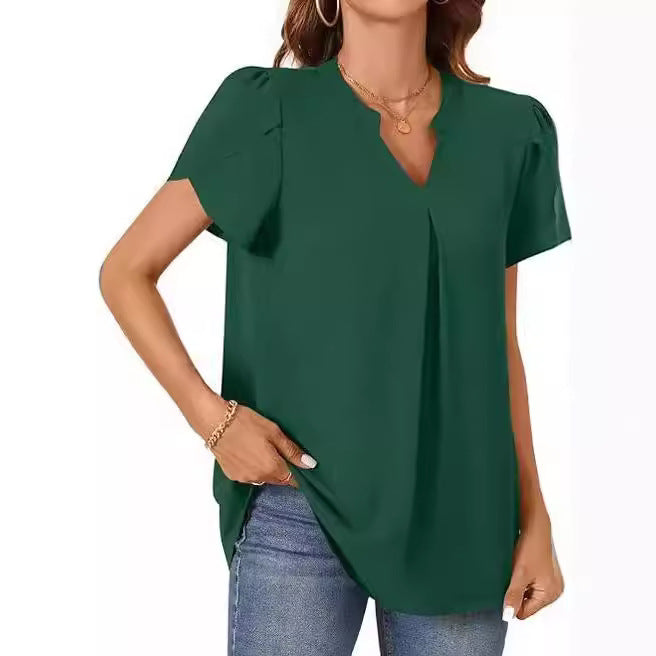 Women's blouse with elegant V-neck detail and light puff sleeves, size [size]