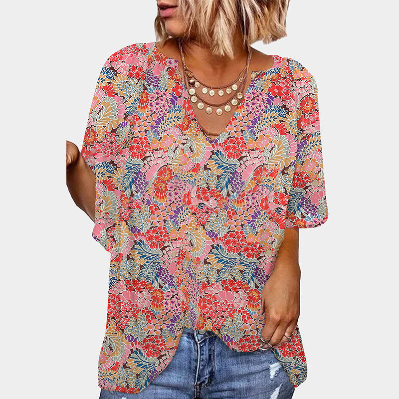 Women's blouse with floral design and relaxed fit, size