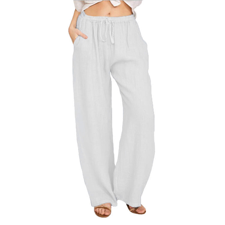 Women's wide linen trousers with elasticated waistband and practical pockets, size