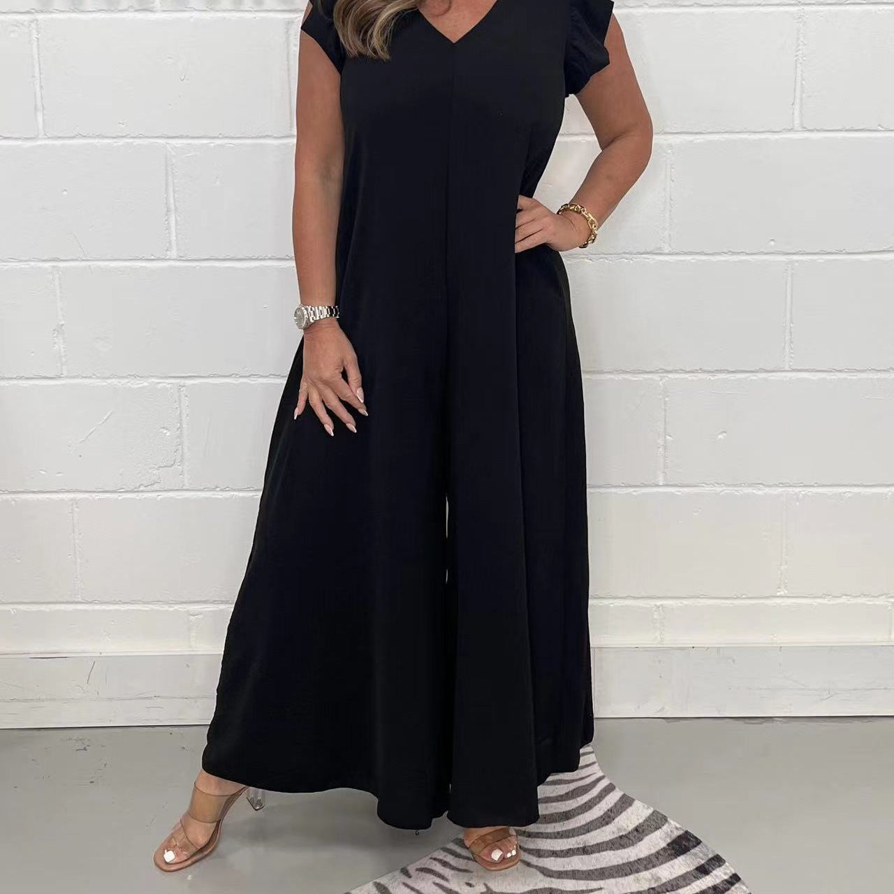 Exklusiver Damen-Jumpsuit mit voluminösen Rüschenärmeln und V-Ausschnitt, Größe S
