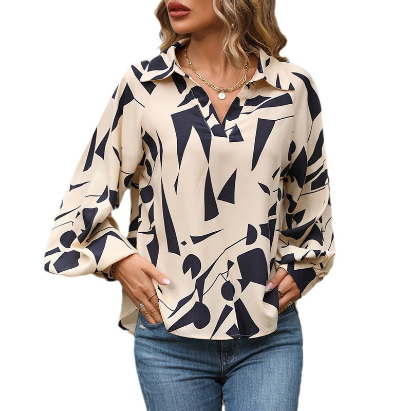 Women's casual blouse with a modern graphic print and voluminous sleeves, size [size missing]