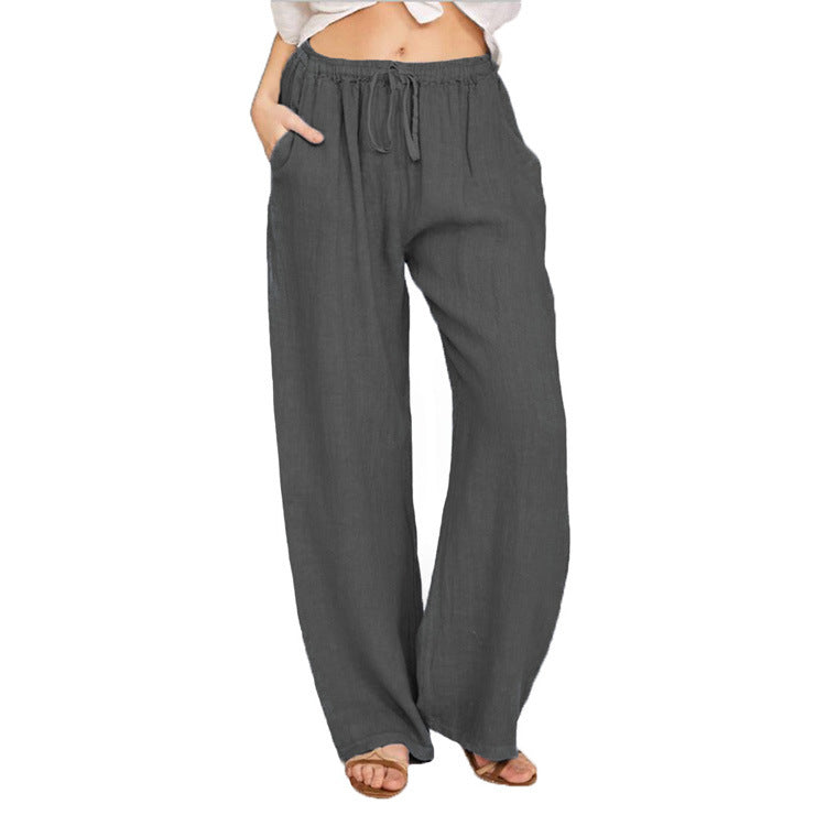 Women's wide linen trousers with elasticated waistband and practical pockets, size