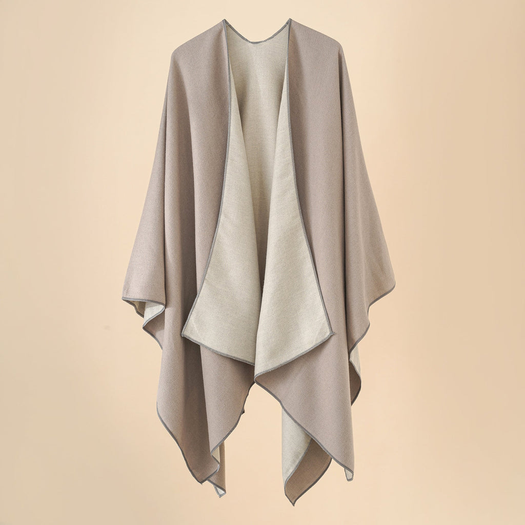 Women's comfortable poncho made of a soft wool blend with an elegant cut, size [size missing]