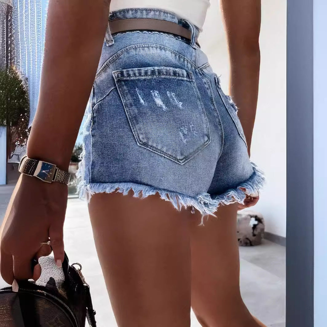 Women's destroyed denim shorts
