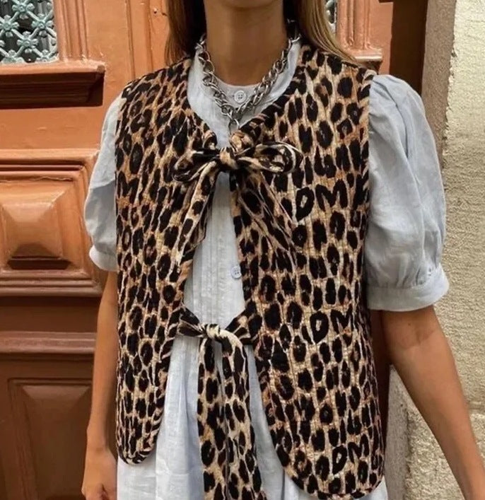 Women's vest in trendy leopard print with playful tie belt, size
