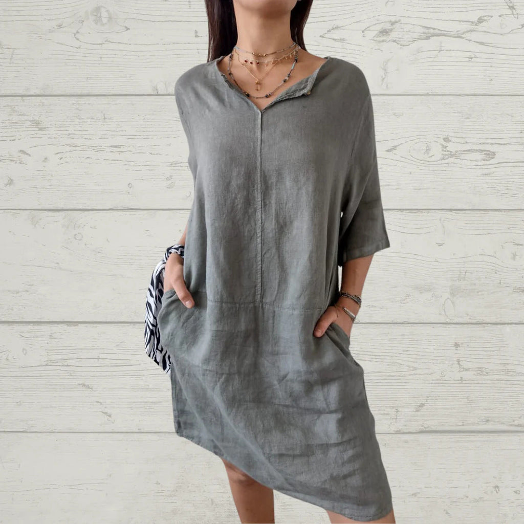 Women's lightweight linen dress with front button detail and side pockets, size