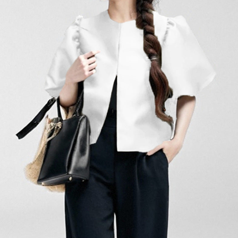 Damenbluse mit voluminösen Puffärmeln und modernem Design, Größe S