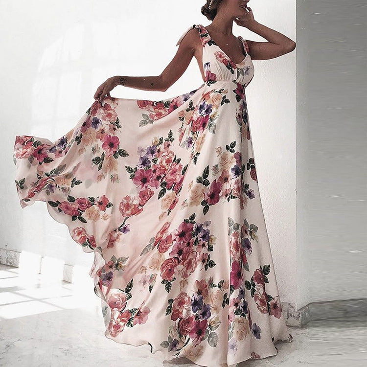 Valenzora | Printed long-sleeved spaghetti strap dress with a wide hem