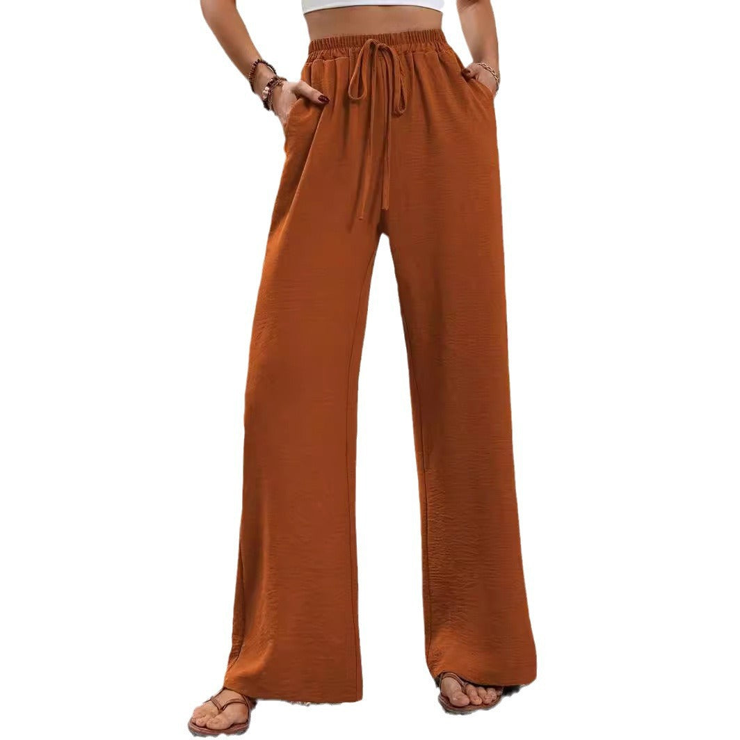 Women's casual, wide-legged leisure trousers with elasticated waistband and side pockets, size S