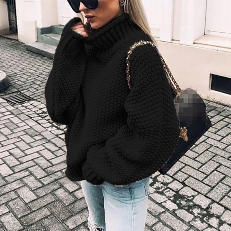 Women's chunky knit sweater with high collar and relaxed fit, size