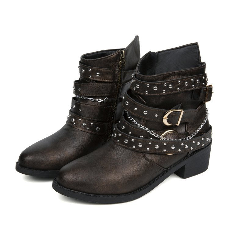 Women's ankle boots with a fashionable strap design and decorative accents, size S