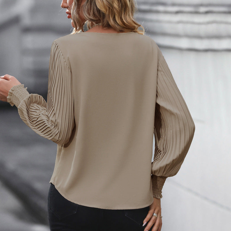 Damenbluse mit voluminösen Puffärmeln und elegantem V-Ausschnitt, Größe [size]