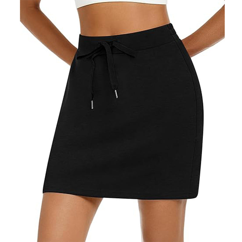 Women's sporty mini skirt with adjustable drawstring and side pockets, size