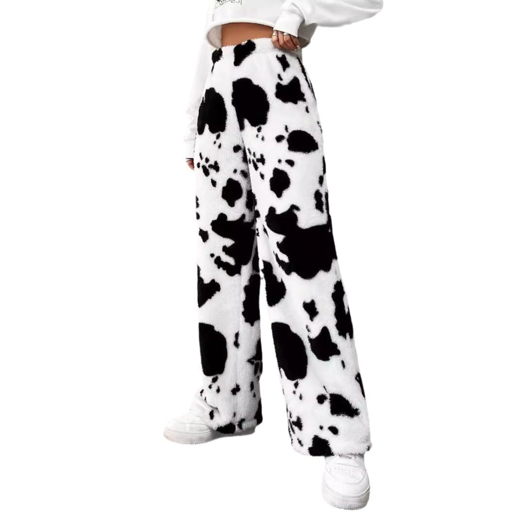 Women's fleece trousers in a trendy cow print, size
