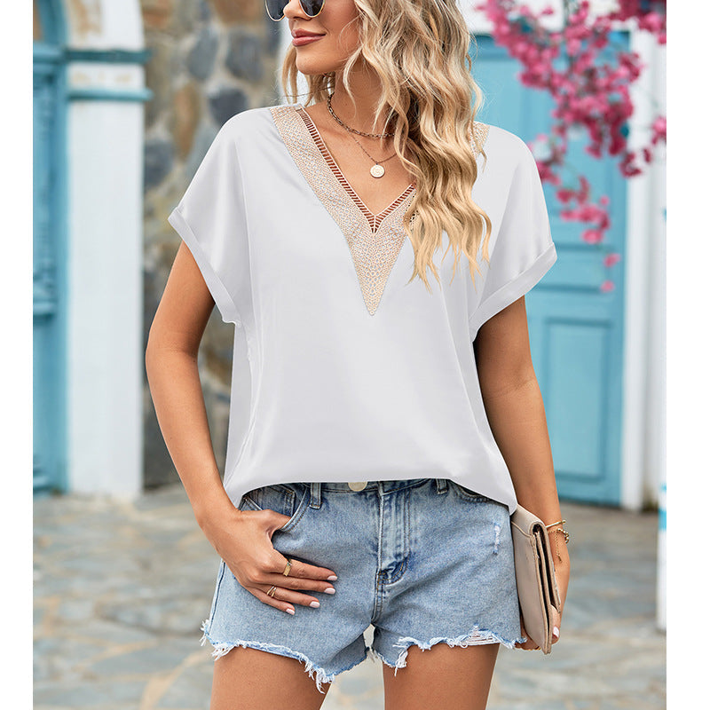 Damenbluse mit tiefem V-Ausschnitt und Häkeldetails, Größe