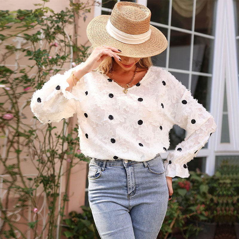 Women's blouse with decorative ruffle details and feminine lace texture, size