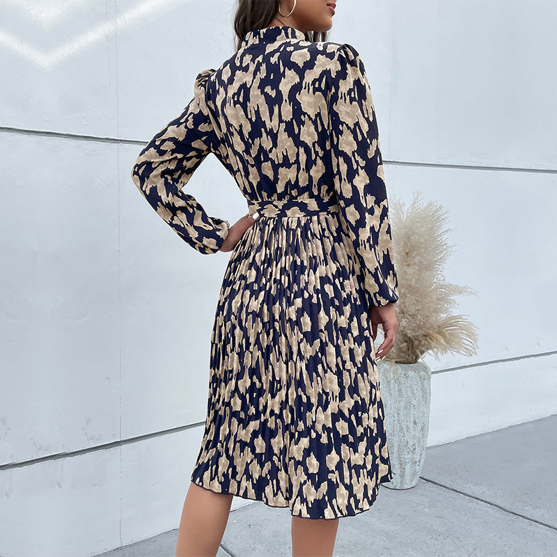 Women's midi dress with a tailored cut and fashionable tie belt, size S