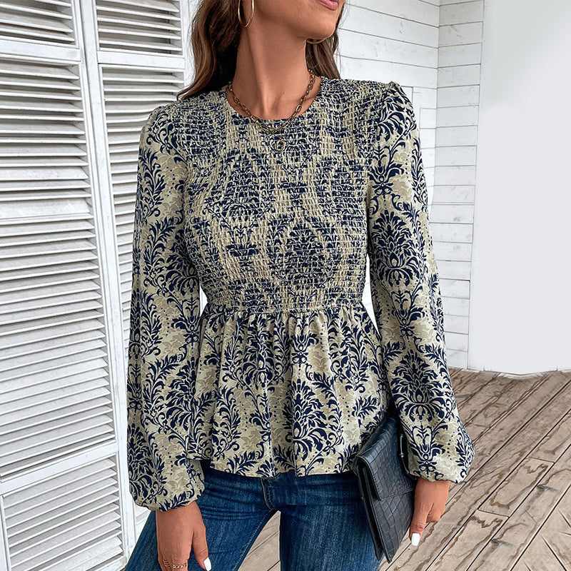 Women's blouse with elegant ruffle seams and floral pattern, size S