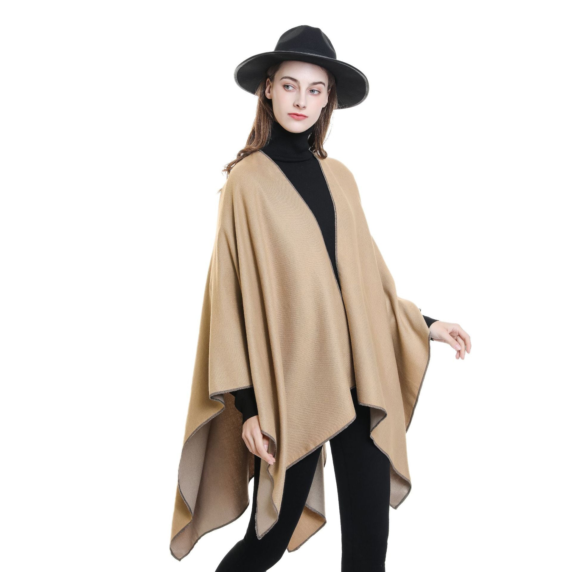 Women's comfortable poncho made of a soft wool blend with an elegant cut, size [size missing]