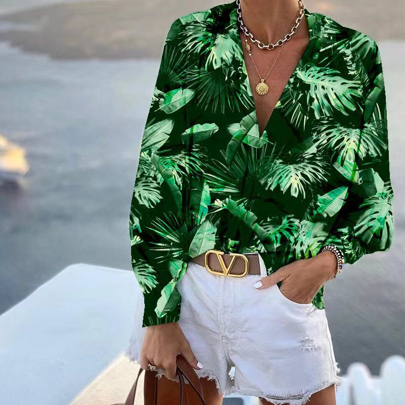 Women's blouse with floral pattern and deep V-neck, size