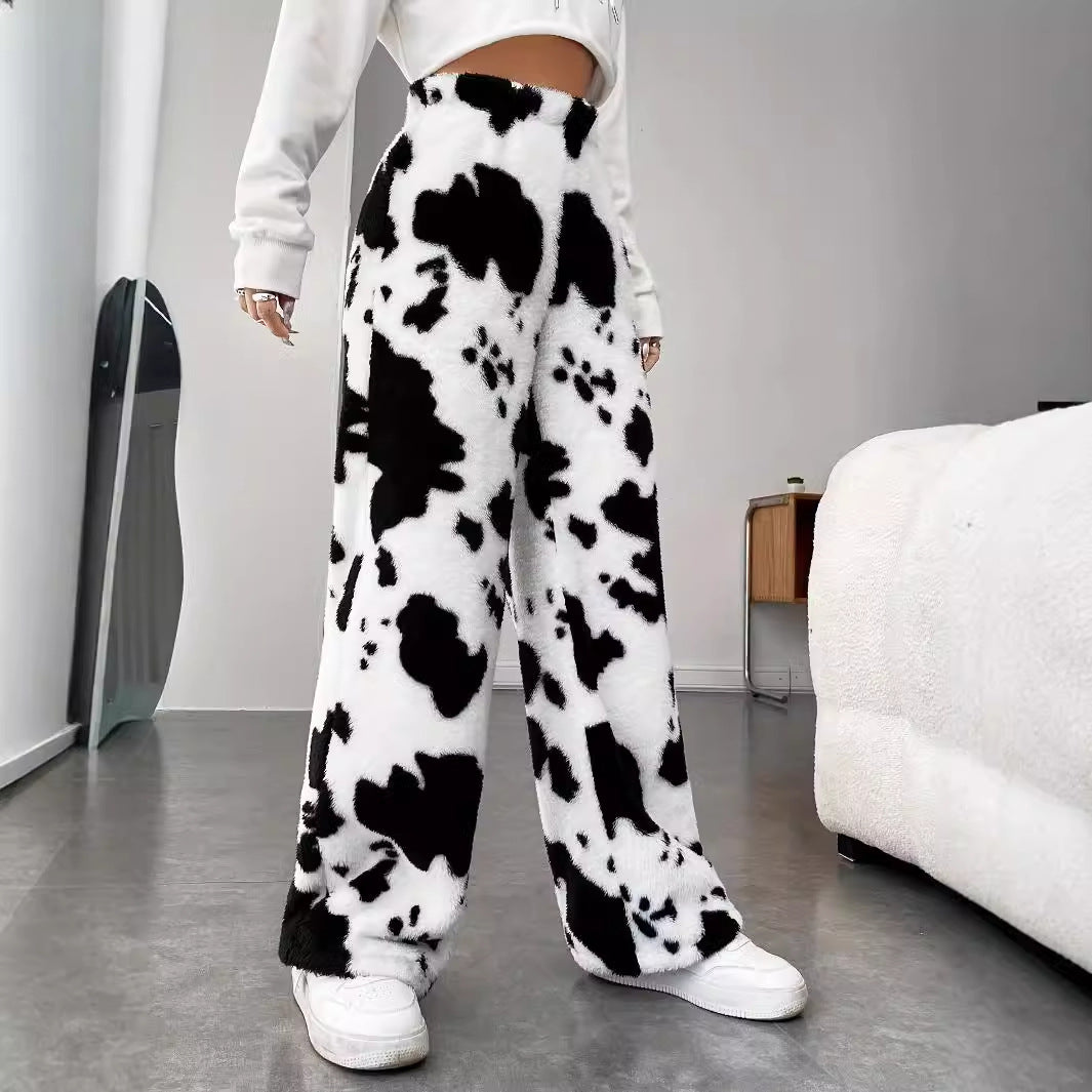 Women's fleece trousers in a trendy cow print, size