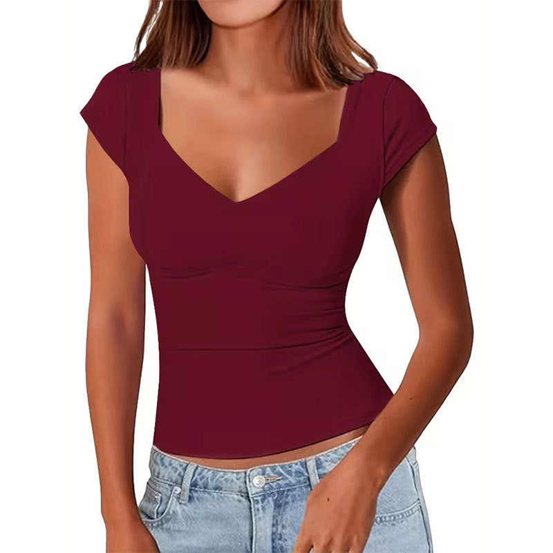 Women's top with a modern sweetheart neckline and chic cut, size S