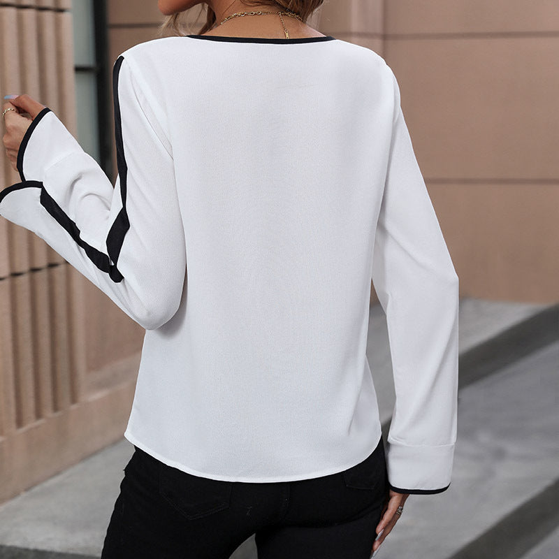 Women's blouse with decorative bow collar and contrasting sleeve cuffs, size [size missing]