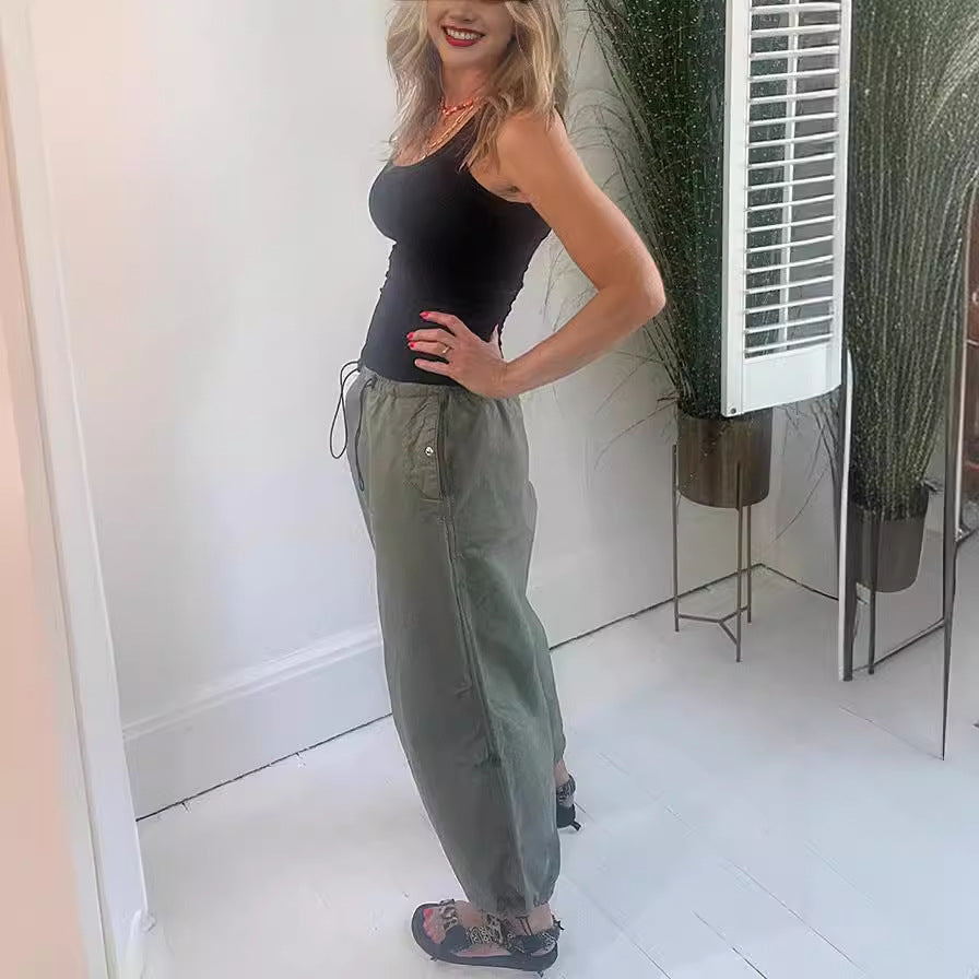 Women's casual pleated trousers made of breathable material, size S