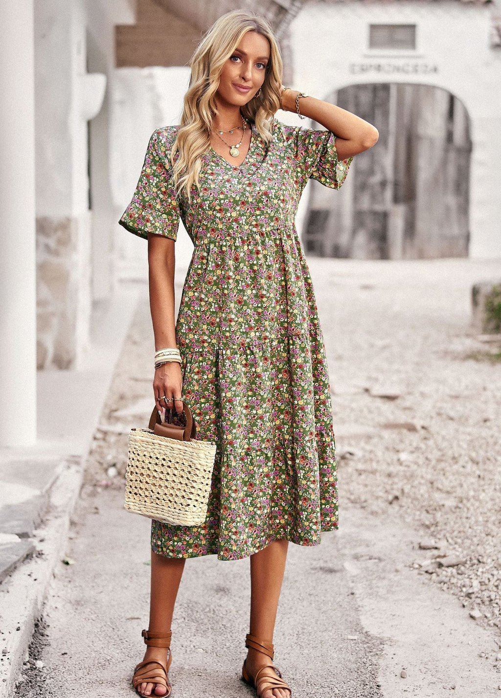 Women's midi dress with floral pattern and playful V-neck, size