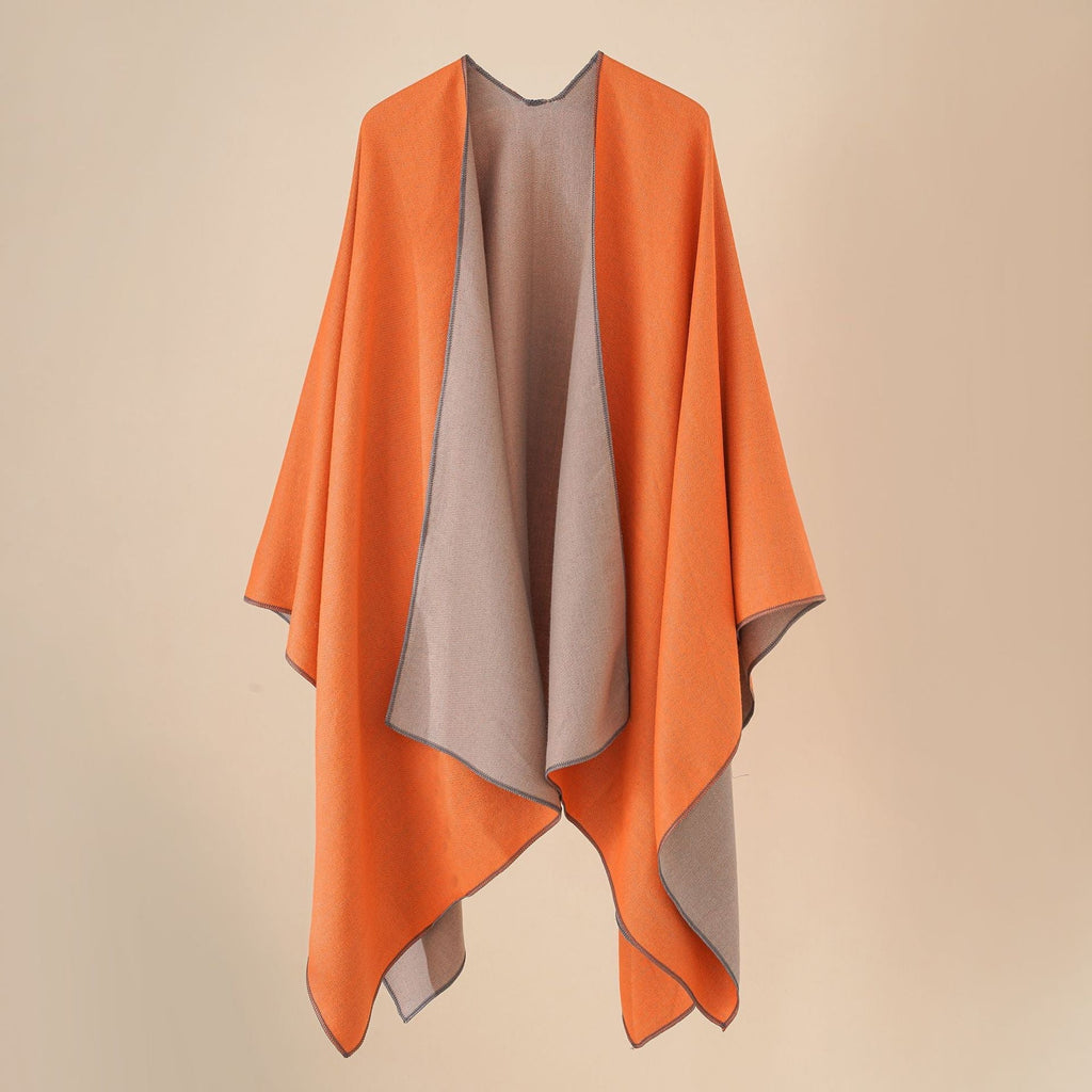 Women's comfortable poncho made of a soft wool blend with an elegant cut, size [size missing]