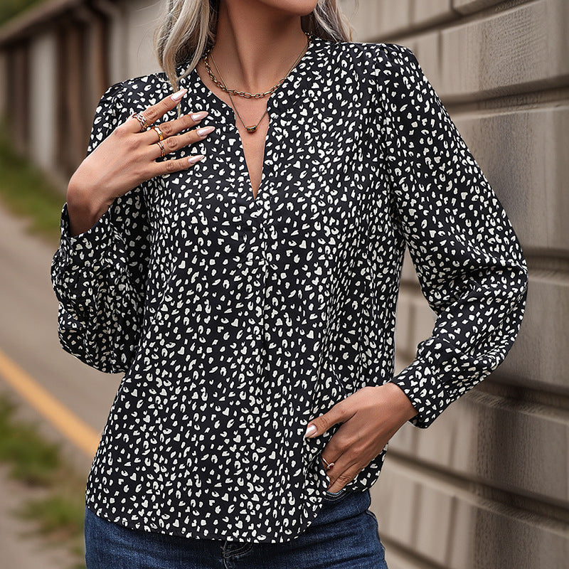 Women's blouse with modern polka dot design and elegant ruffles, size [size missing]