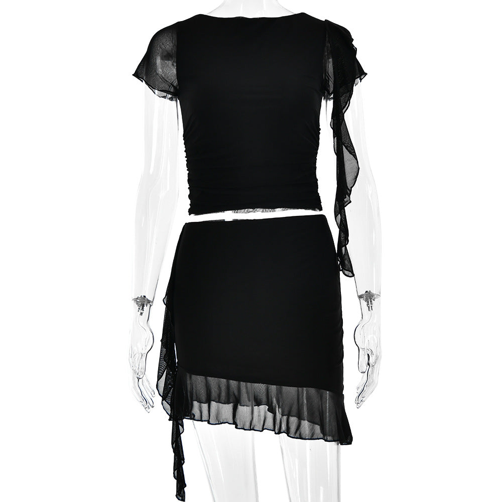 Women's crop top and mini skirt with asymmetrical hem and ruffle details, size