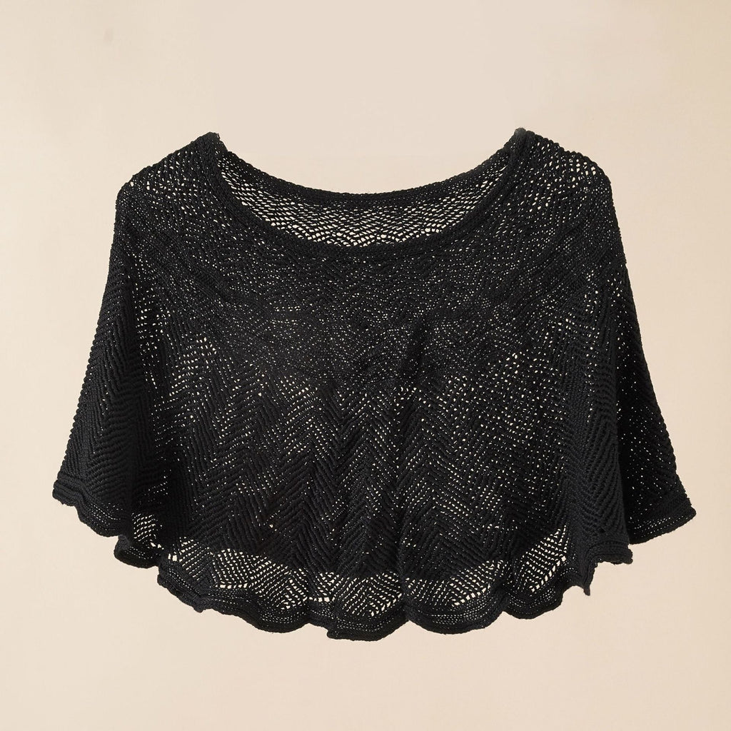 Women's airy knitted poncho in a modern design, size