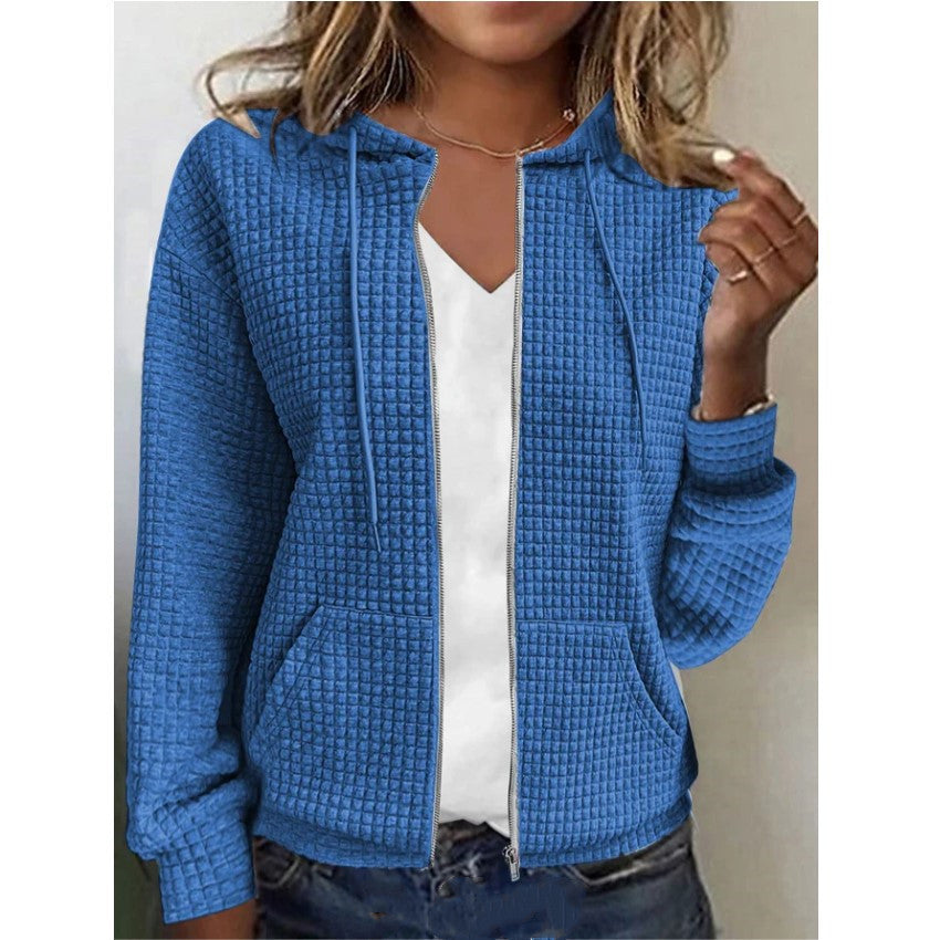 Women's waffle-textured hooded jacket with practical pockets and a modern cut, size S