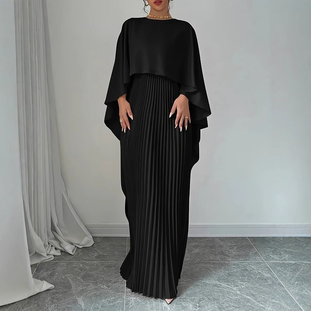 Valenzora | Elegant long dress with batwing sleeves, pleated asymmetrical design, and flowing fit