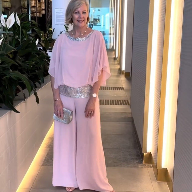 Women's elegant jumpsuit with a flattering cut and sparkling waist belt, size [size missing]