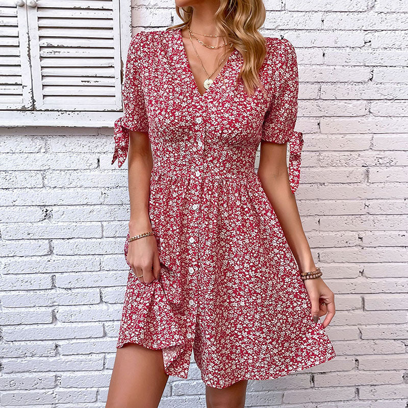 Women's blouse dress with floral patterns and playful ruffles, size