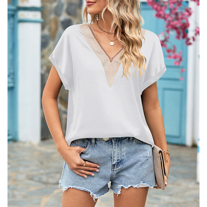 Damenbluse mit tiefem V-Ausschnitt und Häkeldetails, Größe
