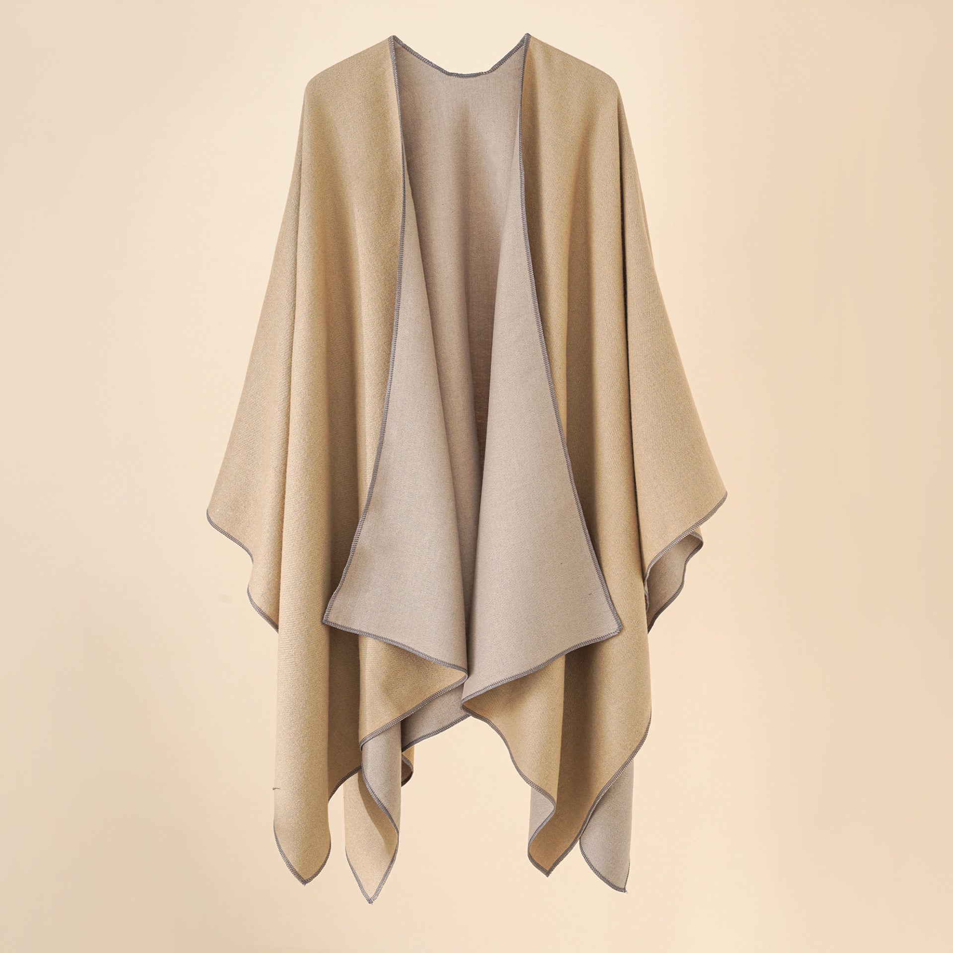 Women's comfortable poncho made of a soft wool blend with an elegant cut, size [size missing]