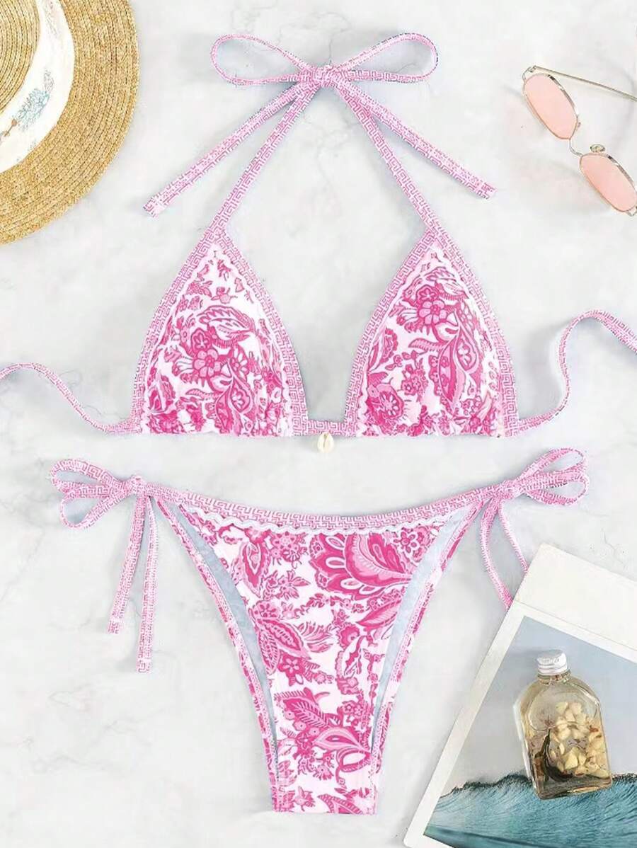 Women's triangle bikini set with playful floral pattern and adjustable ties, size [size]