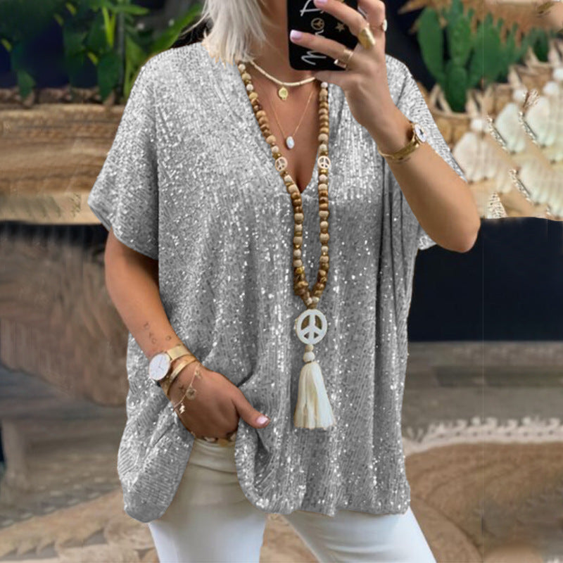 Women's sparkling top with an elegant V-neck and a relaxed fit, size [size]