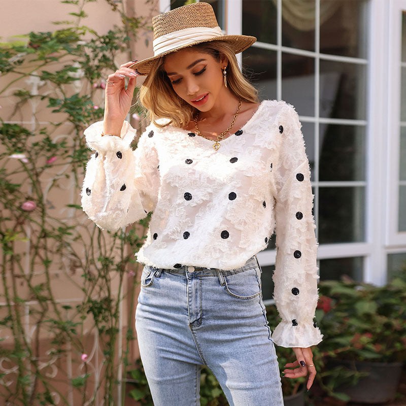 Women's blouse with decorative ruffle details and feminine lace texture, size